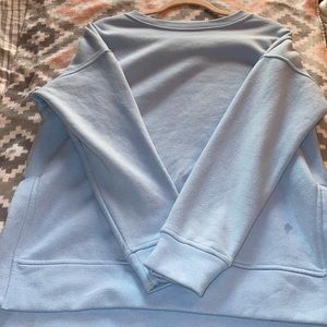 Light blue long sleeved sweatshirt